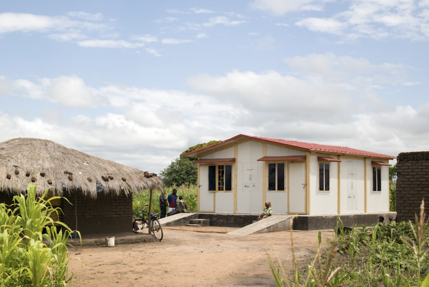 white house in village in malawi