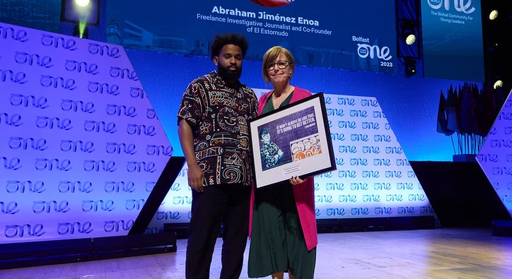 Abraham Jiménez Enoa presented with the Lyra McKee Award for Bravery on stage at the One Young World Summit, Belfast, 2023.