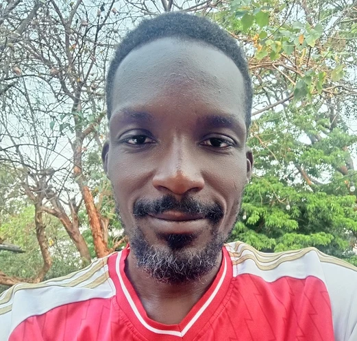 Sunday Olyel headshot