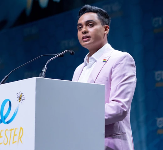 Elvis Martin speaking at the One Young World Summit Manchester 2022